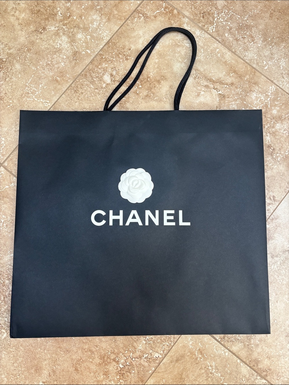 CHANEL Black Shopping Tote with White Camellia Logo